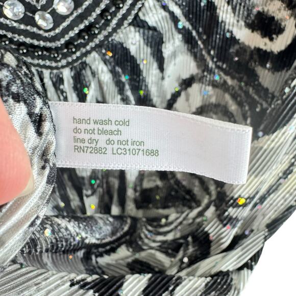 Essentials V-Neck 3/4 Sleeve Accordion Asymmetrical Hem Studded Shimmery Top OX - Picture 7 of 7